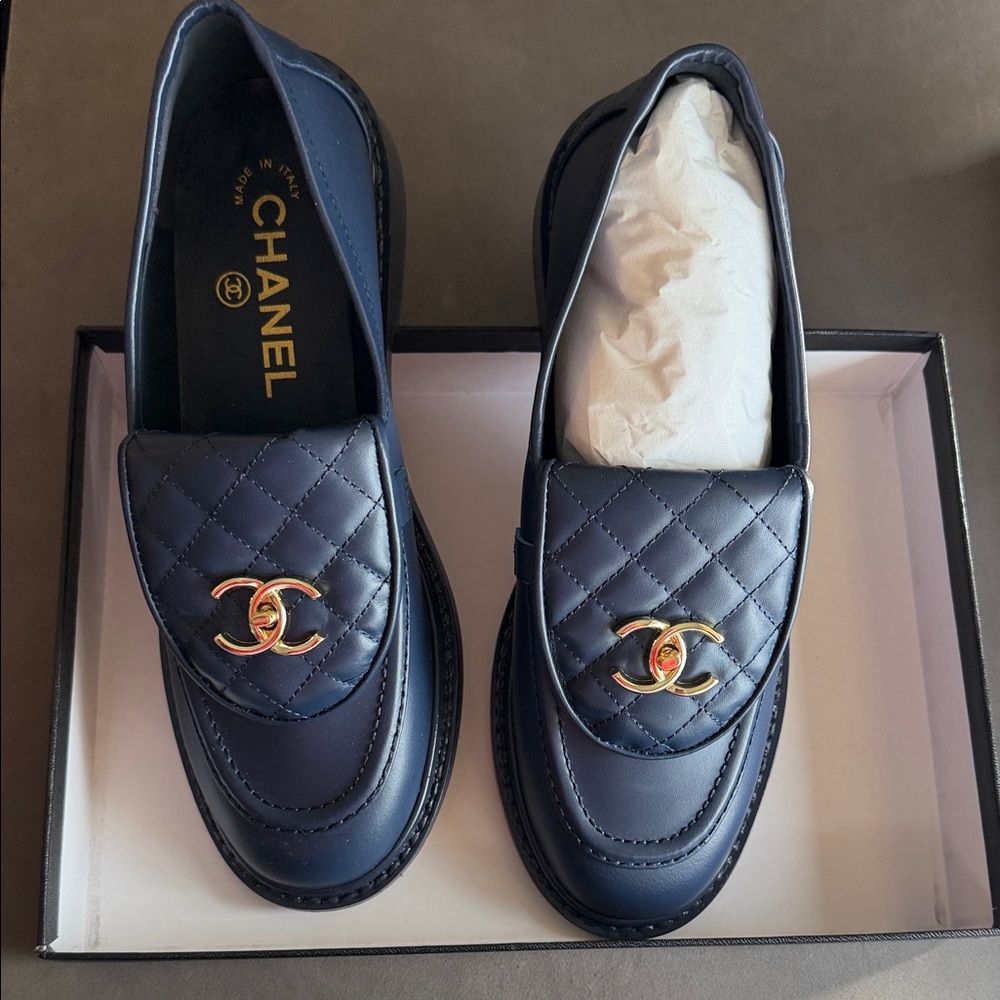 Similar to Chanel Dark Blue Quilted Loafers with Gold Logo